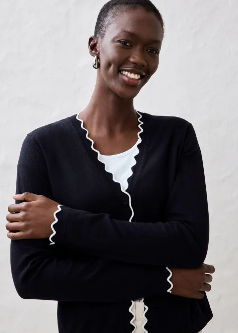 Gilet en fine maille contenant de la soie