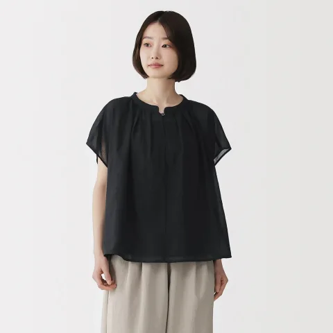 Chemisier semi-transparent à mancherons en coton biologique à haute torsion pour femme