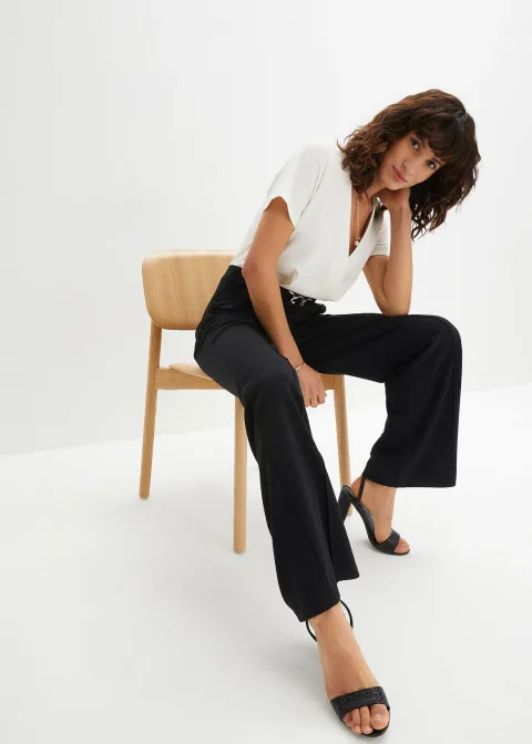 Combinaison avec boucle décorative