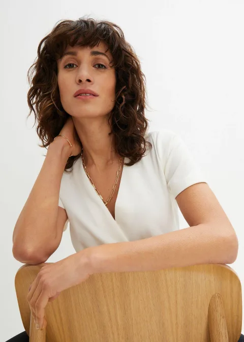 Combinaison avec boucle décorative