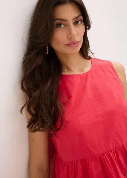 Blouse sans manches avec broderies anglaises, fendue sur les côtés