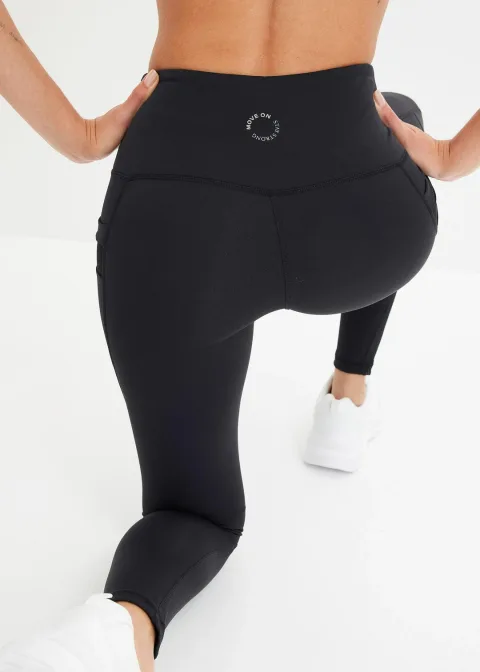 Legging de sport confortable avec mesh et poche pour portable
