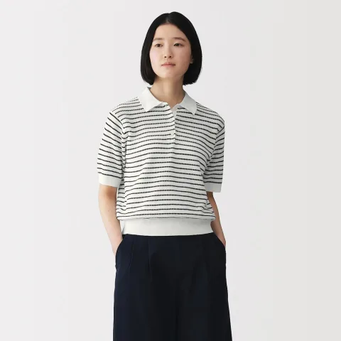 Polo en maille ajourée en coton bio hautement torsadé pour femme