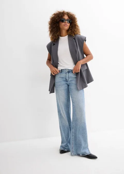 Jean droit et ample, taille mi-haute, peu extensible