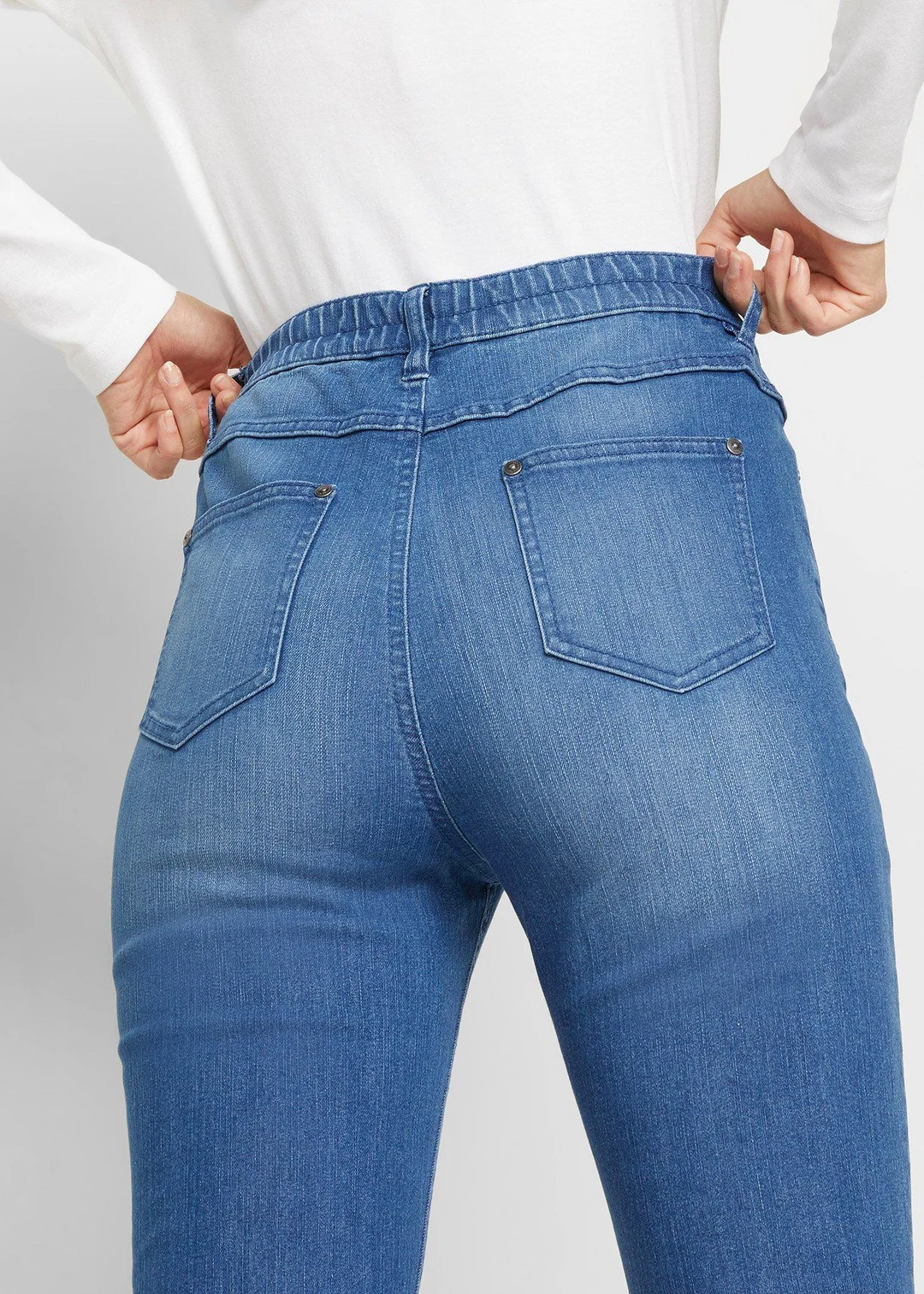 Jean bootcut, taille haute et élastiquée