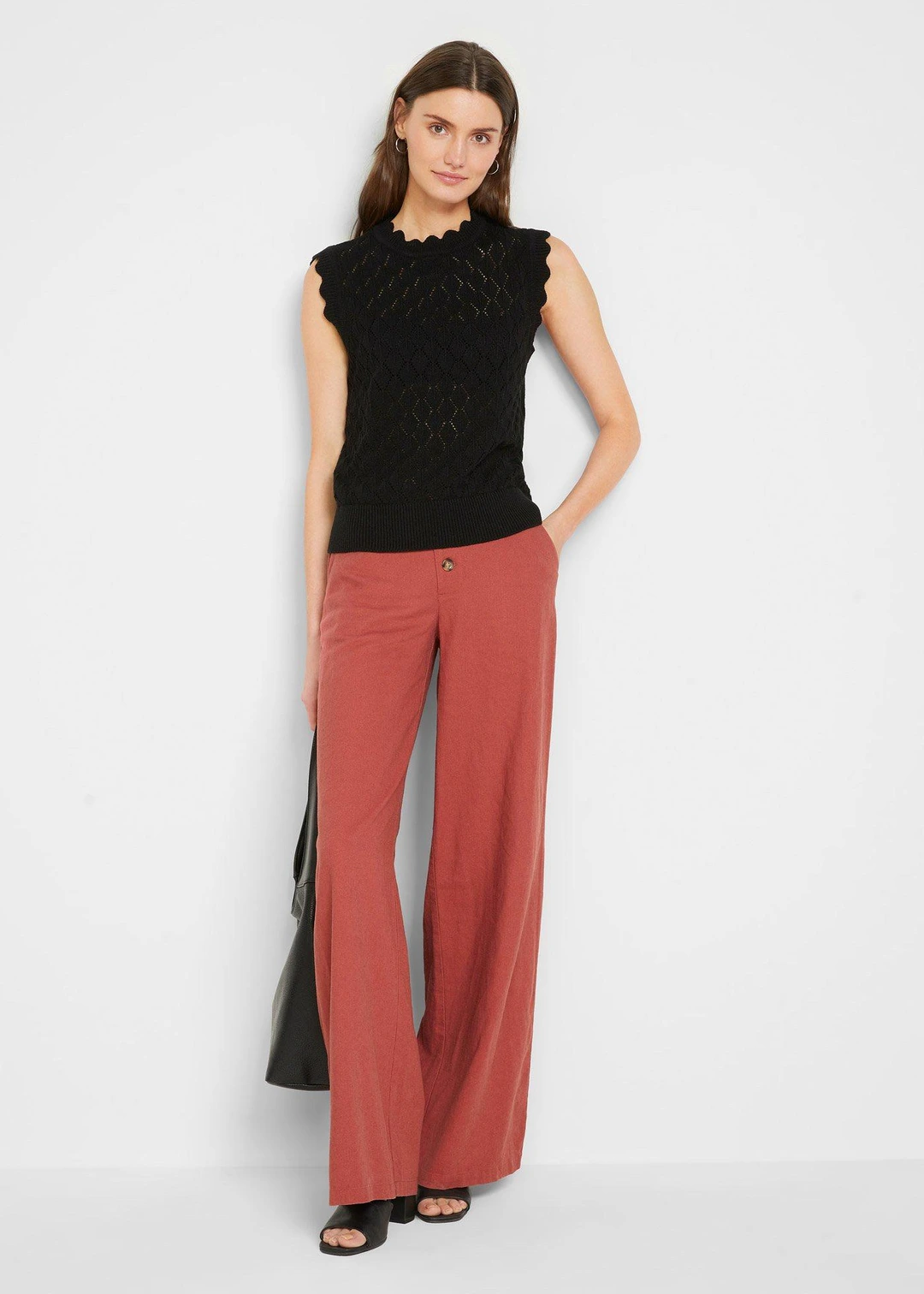 Pull sans manches en maille ajourée