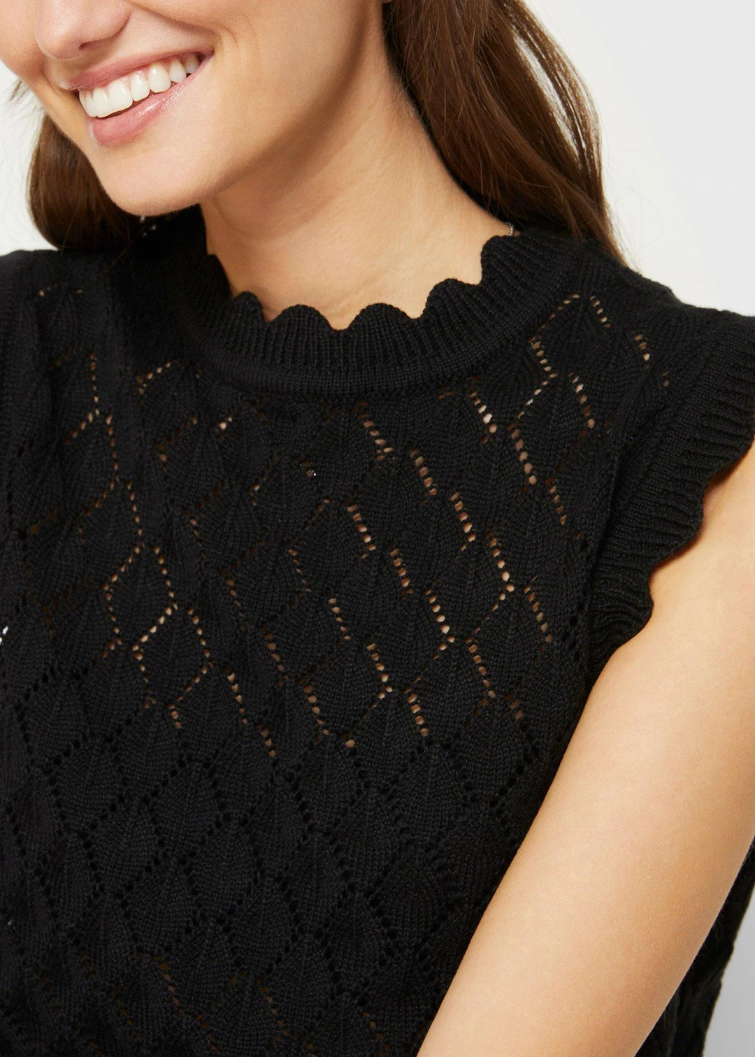 Pull sans manches en maille ajourée