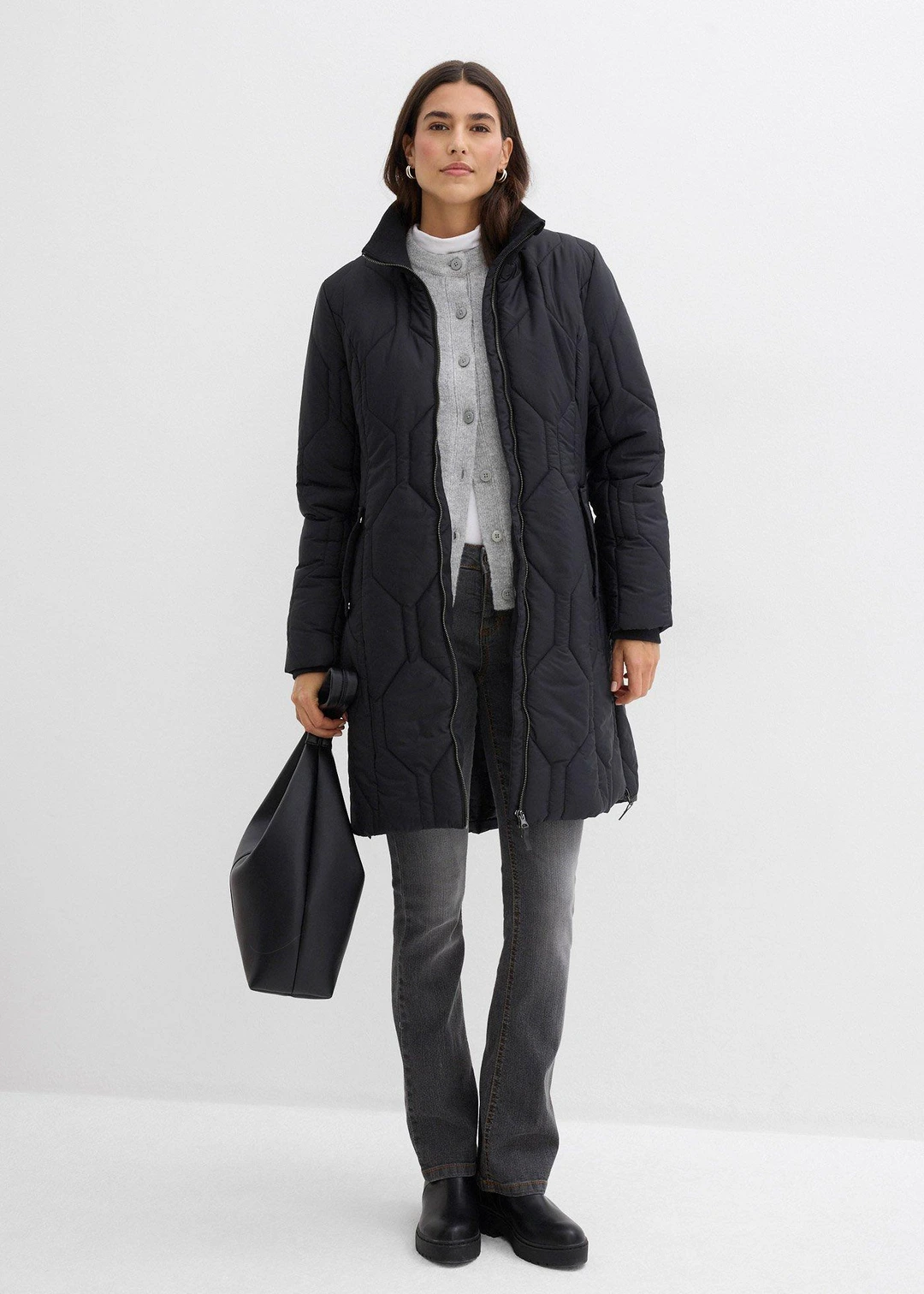 Manteau court avec surpiqûres diamant et zips latéraux