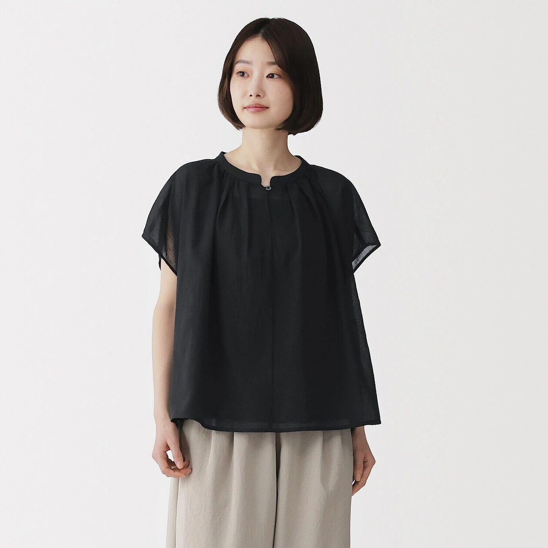 Chemisier semi-transparent à mancherons en coton biologique à haute torsion pour femme